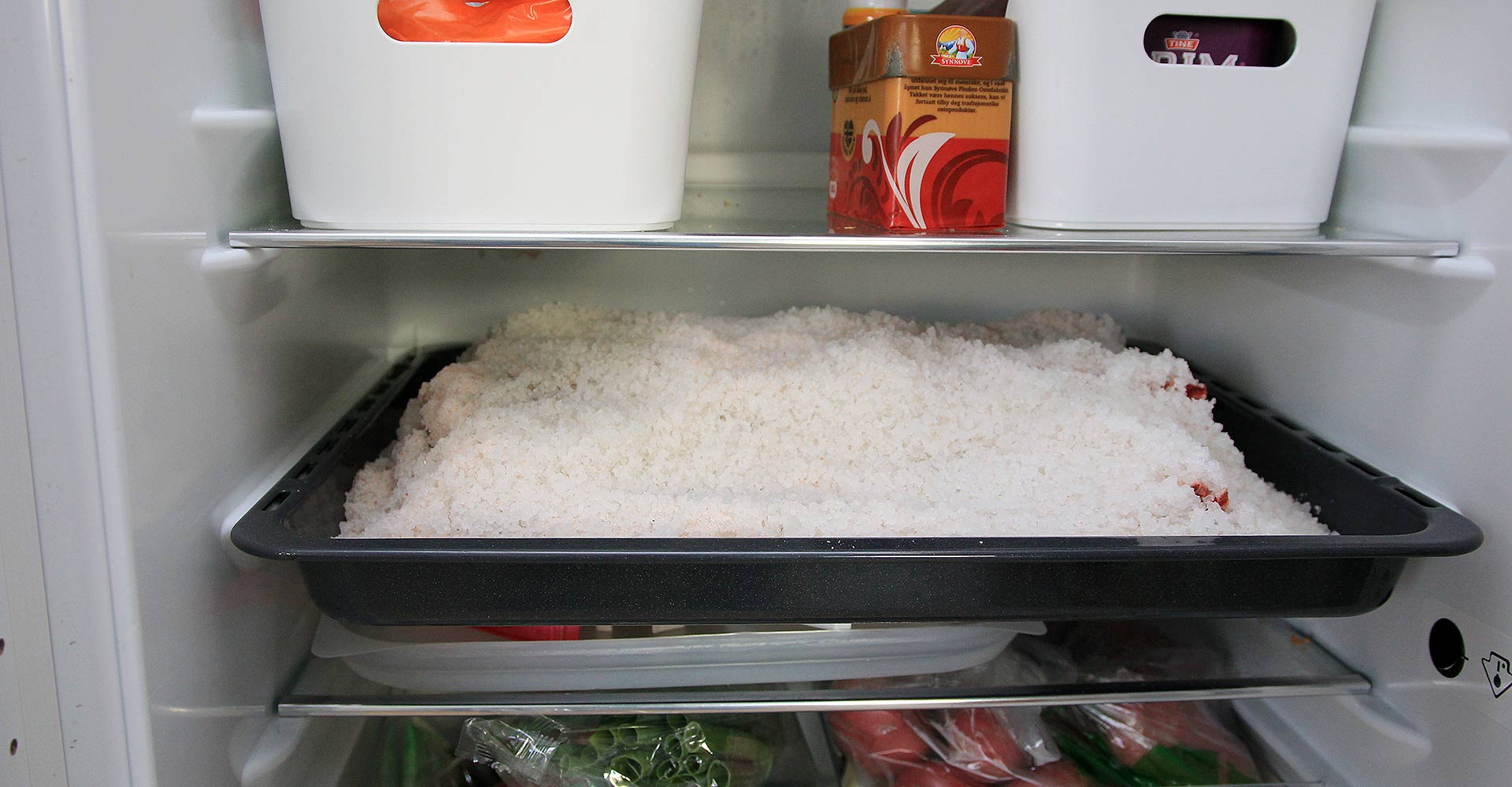 Kid goat ribs in salt in freezer